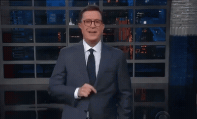 Man In Suit And Tie In Front Of No Sign GIF
