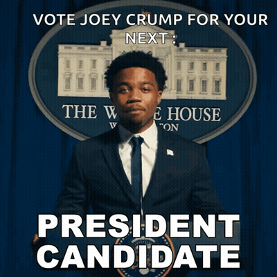 Man In Suit And Tie In Front Of President Candidate Sign GIF