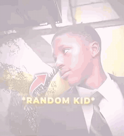 Man In Suit And Tie In Front Of Random Kid Sign GIF