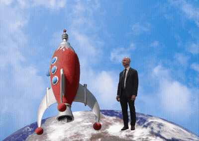 Man in Suit and Tie in Front of Red Rocket