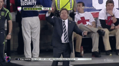 Man In Suit And Tie In Front Of Security Screen GIF