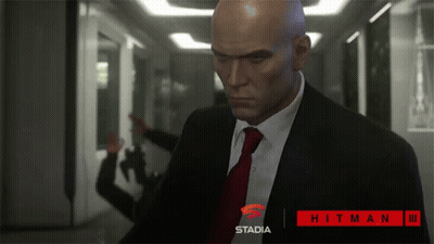 Man In Suit And Tie In Hallway Stadia GIF