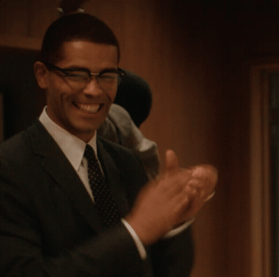 Man In Suit And Tie Laughing GIF