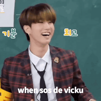 Man In Suit And Tie Laughing At Blackboard GIF