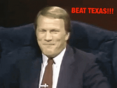 Man in Suit and Tie Laughing Beat Texas