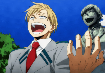 Man In Suit And Tie Laughing Beside Statue GIF