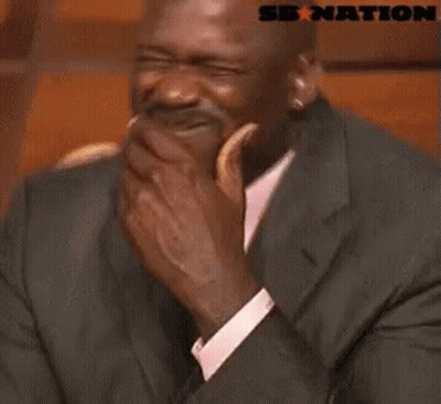 Man In Suit And Tie Laughing GIF