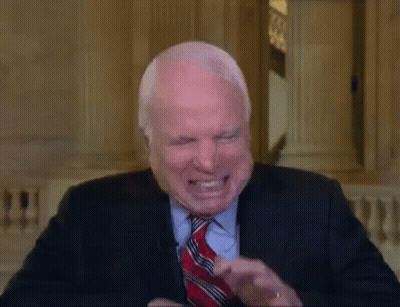Man In Suit And Tie Laughing GIF