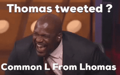 Man In Suit And Tie Laughing Thomas Tweeted GIF