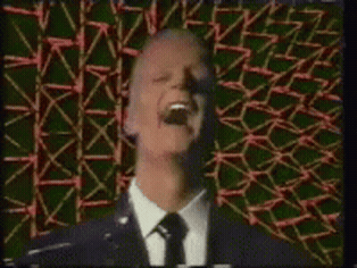 Man In Suit And Tie Laughing GIF
