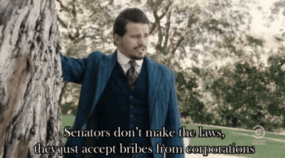 Man In Suit And Tie Leaning Against Tree Saying Senators GIF