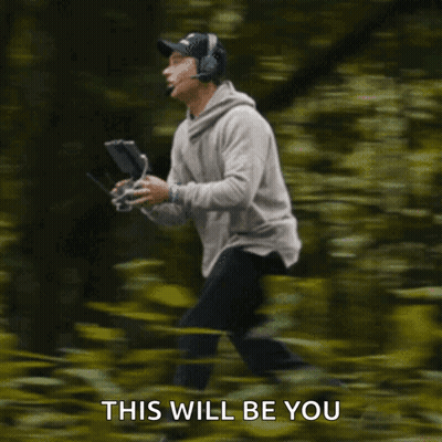 Man In Suit And Tie Leaving Wrestling Arena GIF