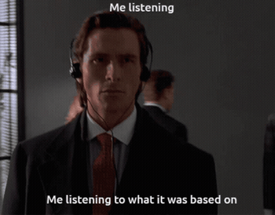 Man In Suit And Tie Listening GIF