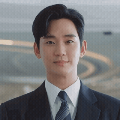 Man In Suit And Tie Looking At Camera GIF