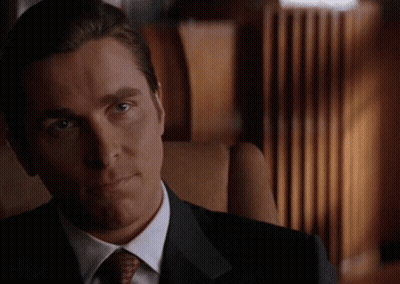 Man In Suit And Tie Looking At Camera GIF