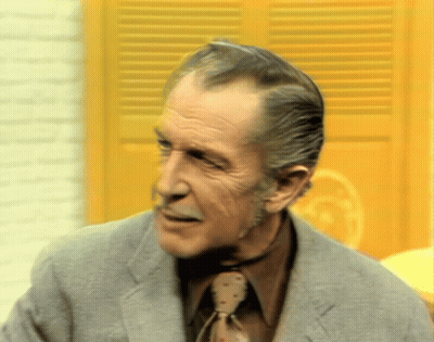 Man In Suit And Tie Looking At Camera GIF