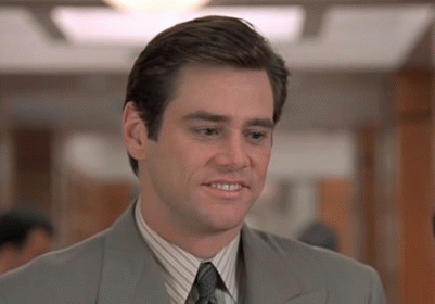 Man In Suit And Tie Looking At Camera GIF