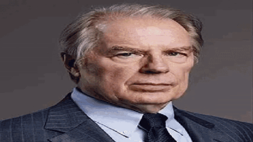 Man In Suit And Tie Looking At Camera GIF