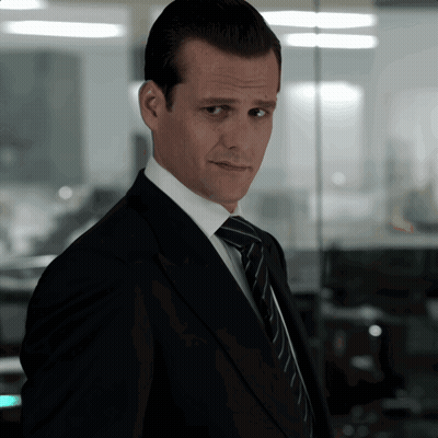 Man In Suit And Tie Looking At Camera GIF