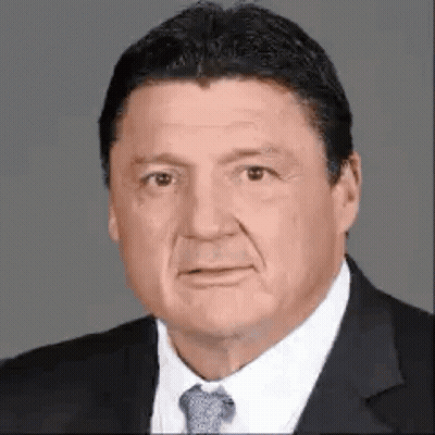 Man In Suit And Tie Looking At Camera GIF