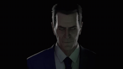 Man In Suit And Tie Looking At Camera GIF