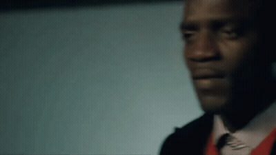 Man In Suit And Tie Looking At Camera GIF
