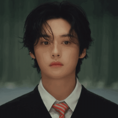 Man In Suit And Tie Looking At Camera GIF