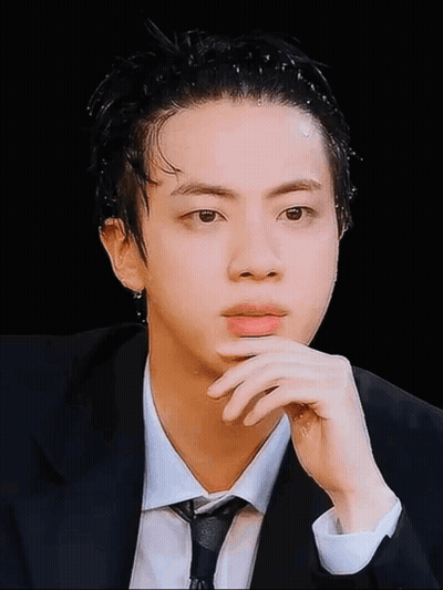 Man In Suit And Tie Looking At Camera GIF