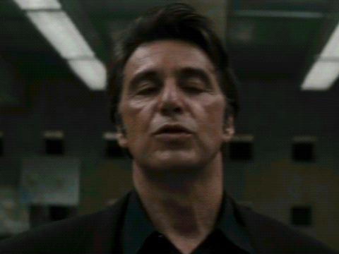 Man In Suit And Tie Looking At Camera GIF
