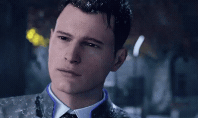 Man In Suit And Tie Looking At Camera GIF