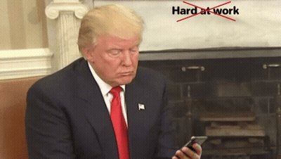 Man In Suit And Tie Looking At Phone Hard At Work Crossed Out Red GIF