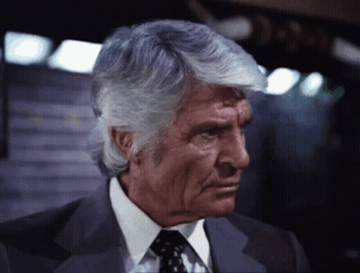 Man In Suit And Tie Looking Down GIF