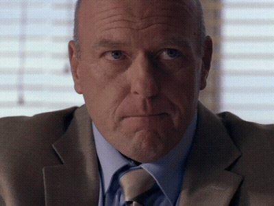 Man In Suit And Tie Looking Serious GIF