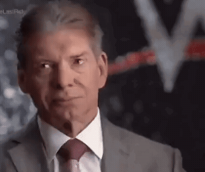 Man In Suit And Tie Looking Serious GIF