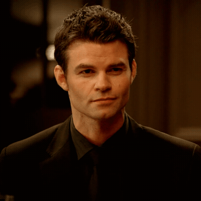 Man In Suit And Tie Looking Serious GIF