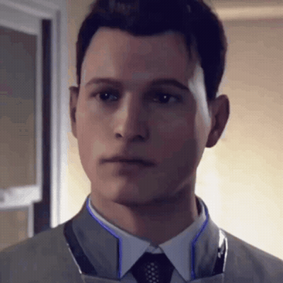 Man In Suit And Tie Looking Serious GIF