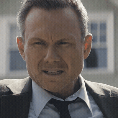 Man In Suit And Tie Looking Serious GIF