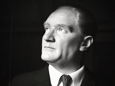 Man In Suit And Tie Looking Up At Sky GIF