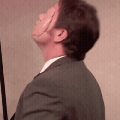 Man In Suit And Tie Looking Up GIF