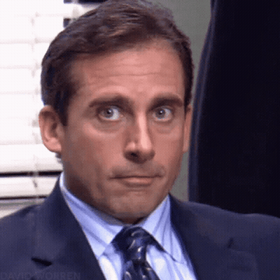 Man In Suit And Tie Making A Face GIF