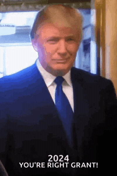 Man In Suit And Tie Making A Face GIF