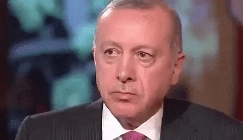 Man In Suit And Tie Making A Face GIF