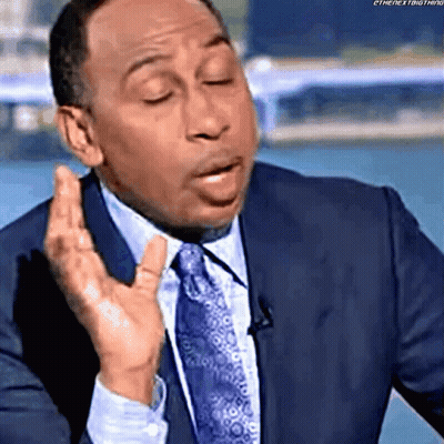 Man In Suit And Tie Making A Face GIF