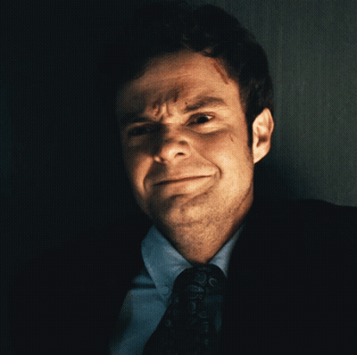 Man In Suit And Tie Making Face GIF