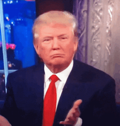 Man In Suit And Tie Making Face GIF