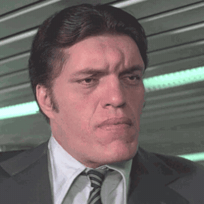 Man In Suit And Tie Making Face GIF