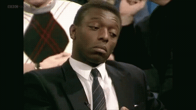 Man In Suit And Tie Making Face GIF