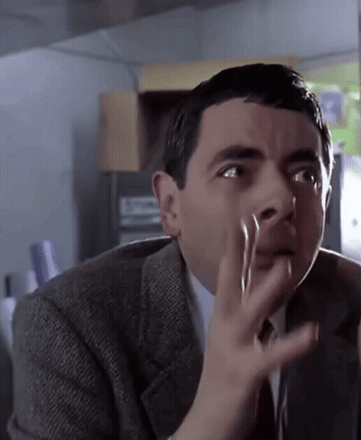 Man In Suit And Tie Making Funny Face GIF