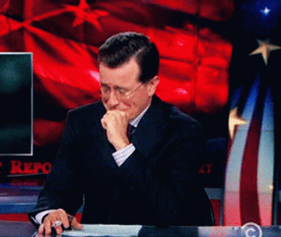 Man In Suit And Tie Making Funny Face At CBS Screen GIF