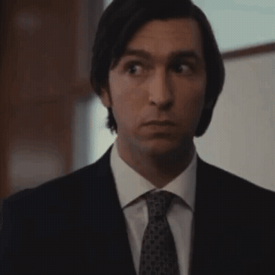 Man In Suit And Tie Making Funny Face GIF